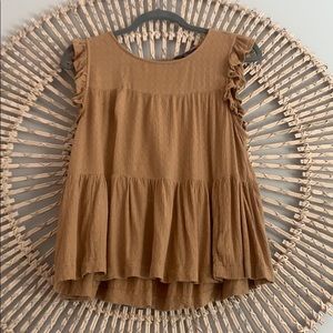 Orange/tan colored tank